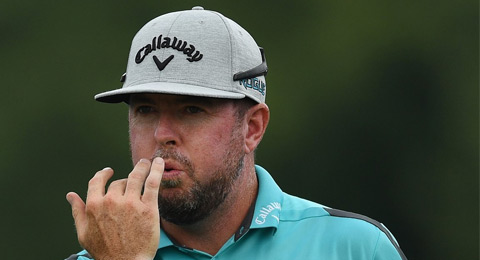 Robert Garrigus brilla antes de abrir el paraguas